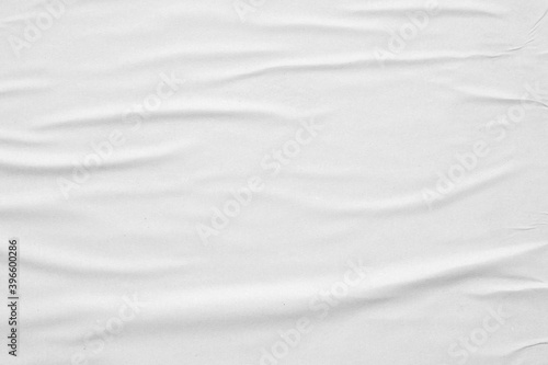 Blank white crumpled and creased paper poster texture background