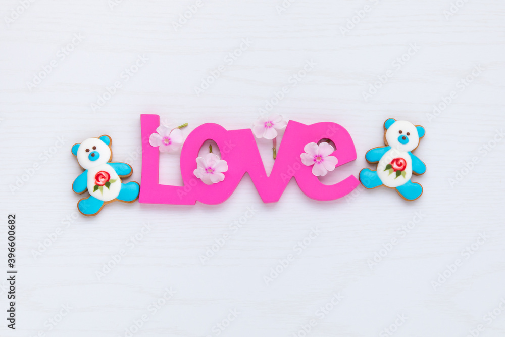 Coposition with Love word and two bear shape cookies. Coposition with Love word and two bear shape cookies.