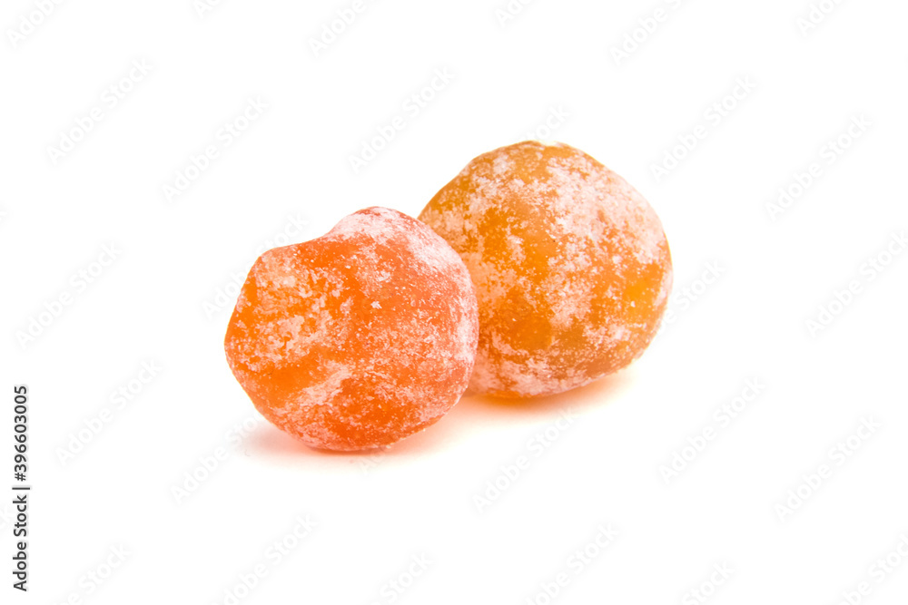 Dried kumquats, candied fruits isolated on white Dried kumquats, candied fruits isolated on white
