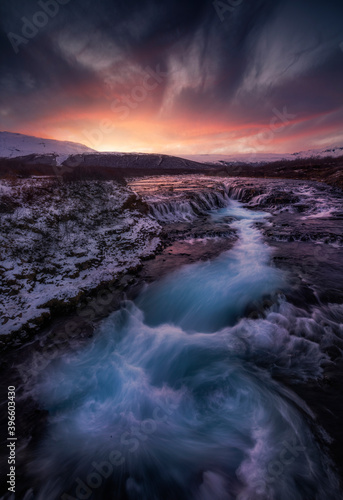 Sunset over the river in Iceland  in the Bruarfoss falls.