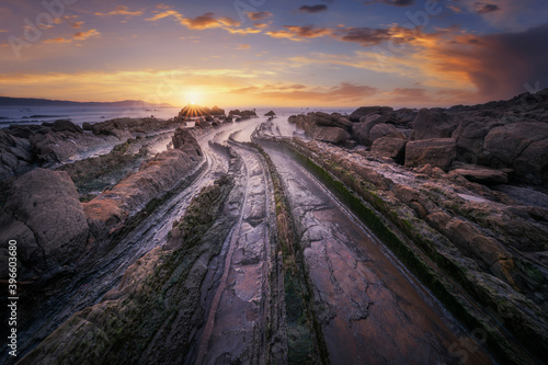 Sunset in the Cantabrian Sea, in the Barrika Beach with their famous rock formations, the flysch