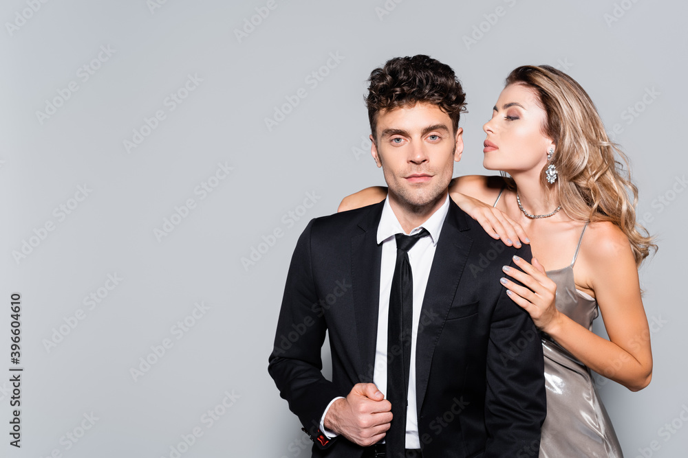 elegant young couple posing isolated on grey, stock image elegant young couple posing isolated on grey, stock image