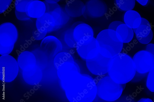 Abstract dark blue bokeh background