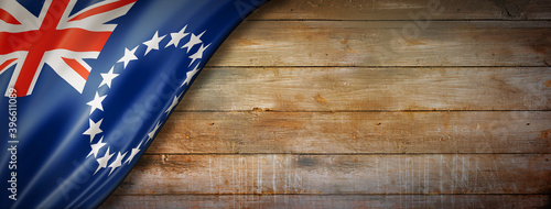 Fotografi Cook Islands flag on vintage wood wall banner
