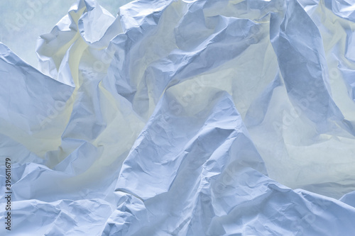 Wallpaper Mural 
Crumpled paper against a window as an abstract background. Torontodigital.ca