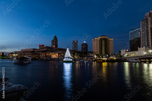 Beautiful Sunset view and Christmas tree light on the Hillsborough River, Tampa, Florida, USA