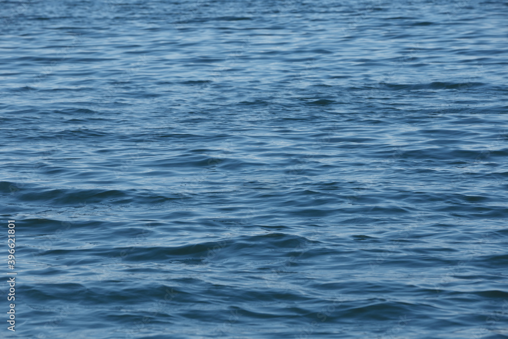 Background of rippling surface of blue sea Background of rippling surface of blue sea