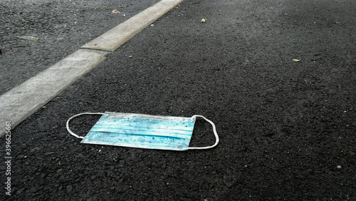 Disposable COVID19 mask littering the street, Birmingham UK