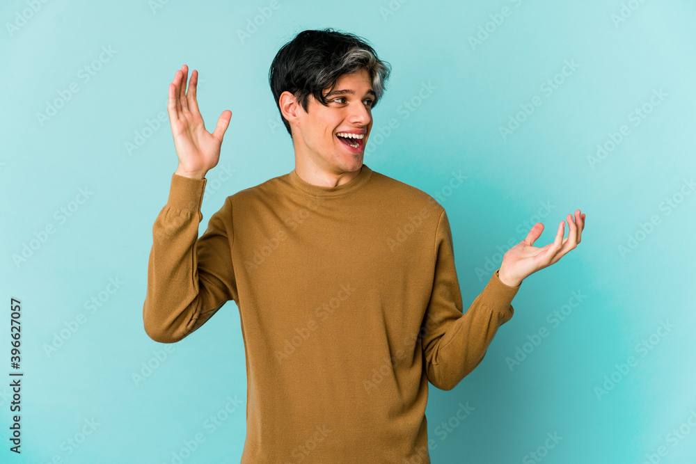 Young caucasian skinny man expressing emotions isolated on blue background Young caucasian skinny man expressing emotions isolated on blue background