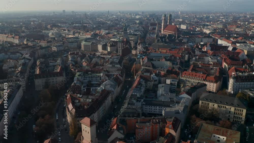 Famous Isa Tor City Gate in Munich, Germany with little traffic due to Coronavirus Covid 19 Pandemic, Aerial View above German Cityscape with Frauenkirche and Marienkirche Famous Isa Tor City Gate in Munich, Germany with little traffic due to Coronavirus Covid 19 Pandemic, Aerial View above German Cityscape with Frauenkirche and Marienkirche