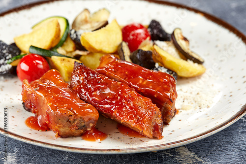 grilled ribs with baked vegetables