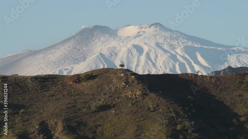 the snow-covered volcano etna yitto in the first autumn colds on a sunny day