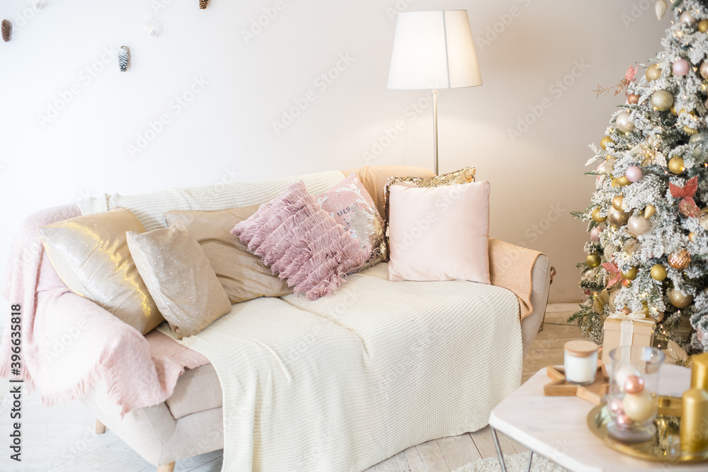 Living interior with sofa and chrismas tree