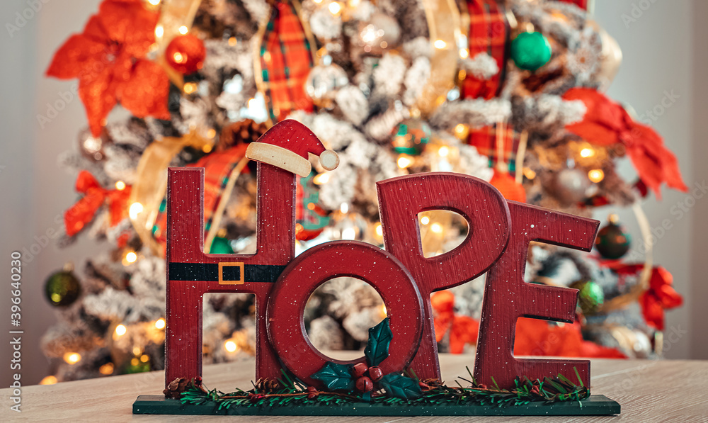 Hope with Christmas tree background and beautiful colors