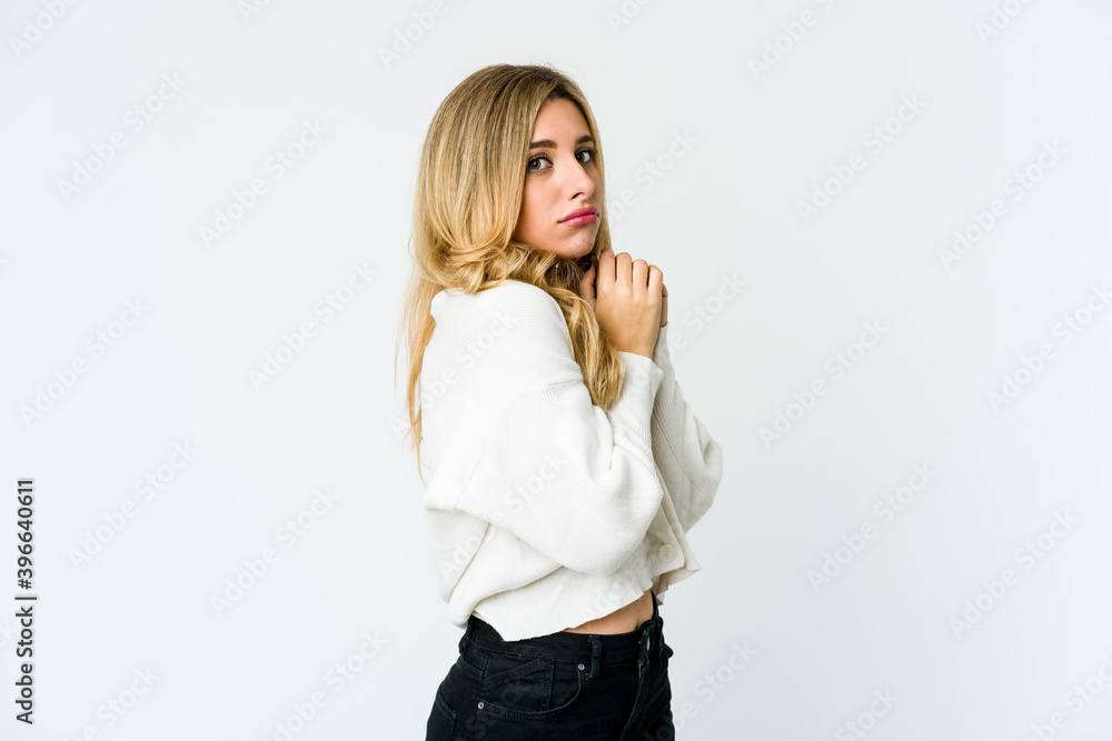 Young caucasian blonde woman scared and afraid. Young caucasian blonde woman scared and afraid.
