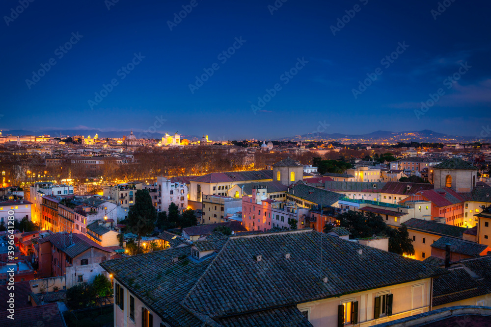 Fototapeta premium Panorama of Rome city at dusk with beautiful architecture, Italy