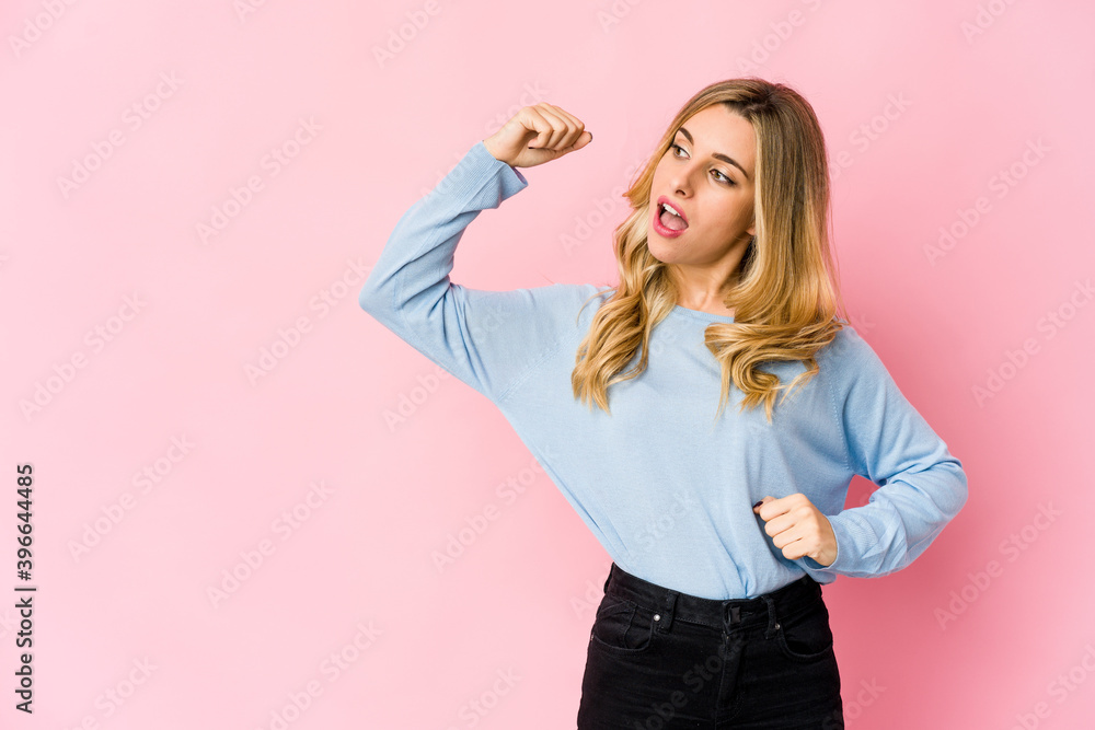 Young caucasian blonde woman holding something with palms, offering to camera. Young caucasian blonde woman holding something with palms, offering to camera.