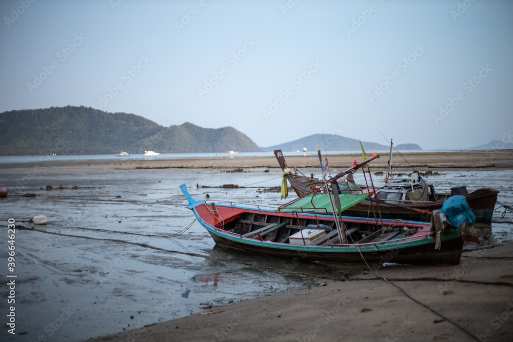 Thai fisherman boat parked at the coast