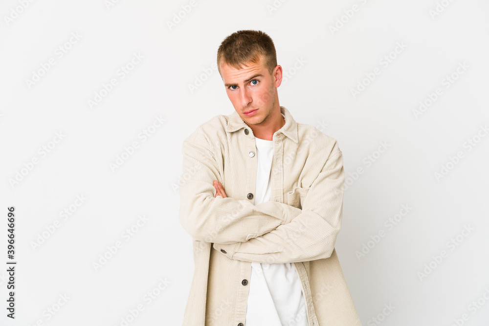 Young caucasian handsome man unhappy looking in camera with sarcastic expression. Young caucasian handsome man unhappy looking in camera with sarcastic expression.