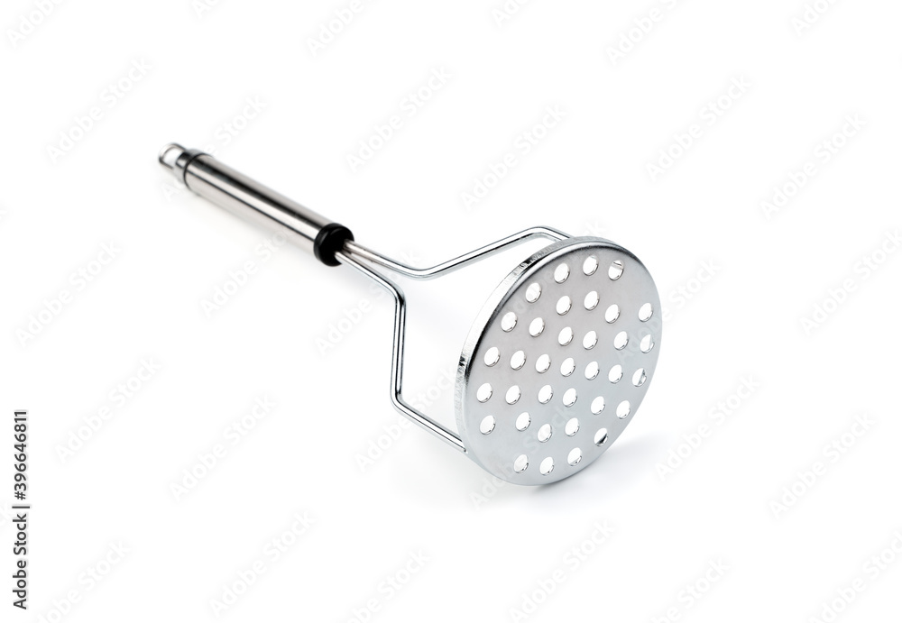 Kitchen item for making mashed potatoes on a white background. Concept of culinary backgrounds. Kitchen item for making mashed potatoes on a white background. Concept of culinary backgrounds.