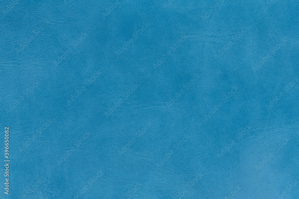 Cyan textured smooth leather surface background, small grain