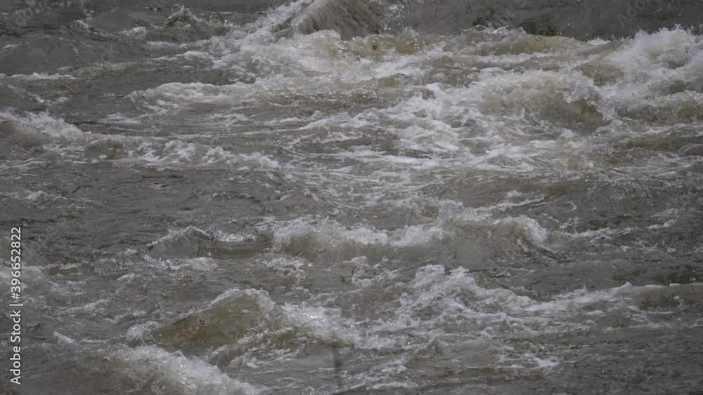 Wild and dangerous waters due to the rising of a river Wild and dangerous waters due to the rising of a river