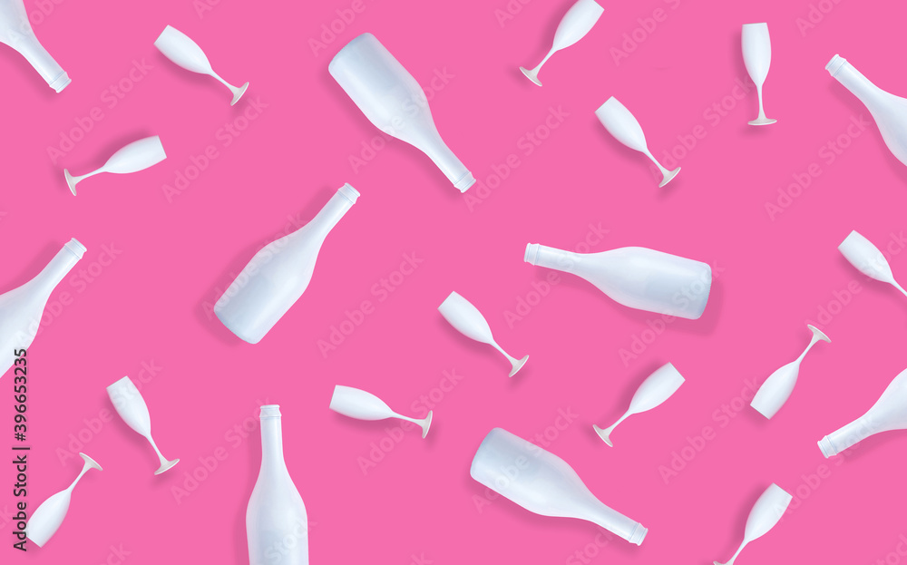 Fototapeta premium Creative holiday season concept with champaign glasses and bottles on pastel pink background. Flat lay design