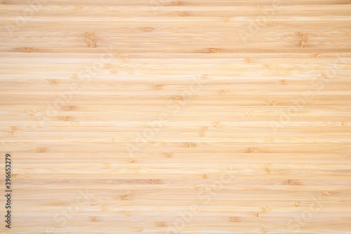 Wooden light background. Narrow horizontal slats. Focusing in the center of the frame.