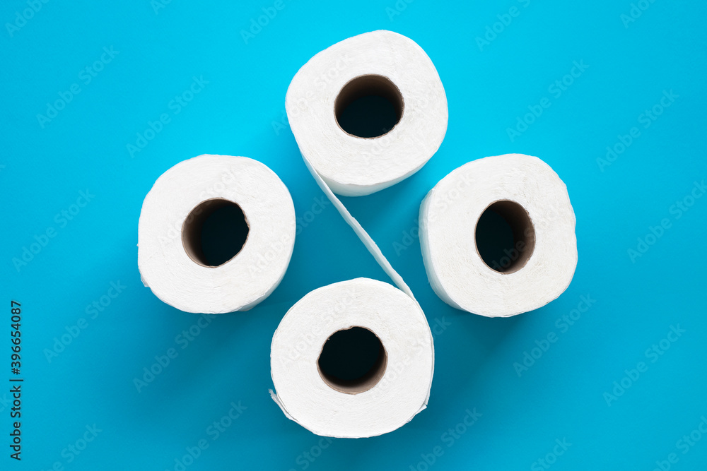 Toilet paper roll on blue background. Toilet paper roll on blue background.