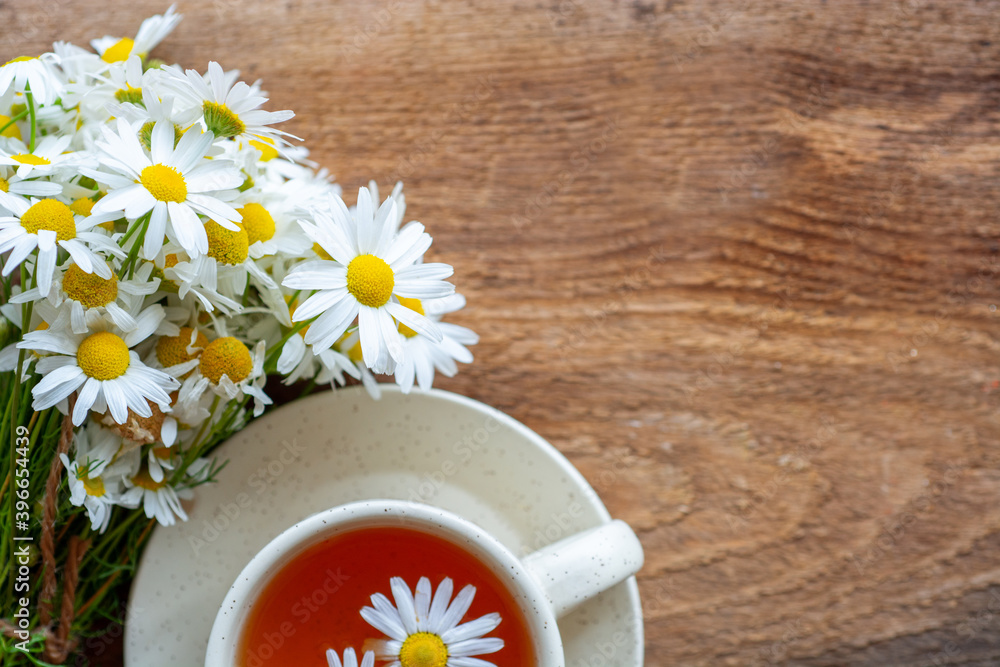 herbal chamomile tea and daisy flowers. doctor treatment and prevention of immune concept, medicine - folk, alternative, complementary, traditional medicine herbal chamomile tea and daisy flowers. doctor treatment and prevention of immune concept, medicine - folk, alternative, complementary, traditional medicine