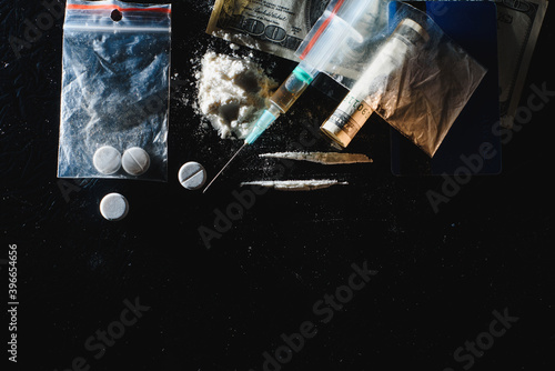 Fototapeta Naklejka Na Ścianę i Meble -  Hard drugs on dark table