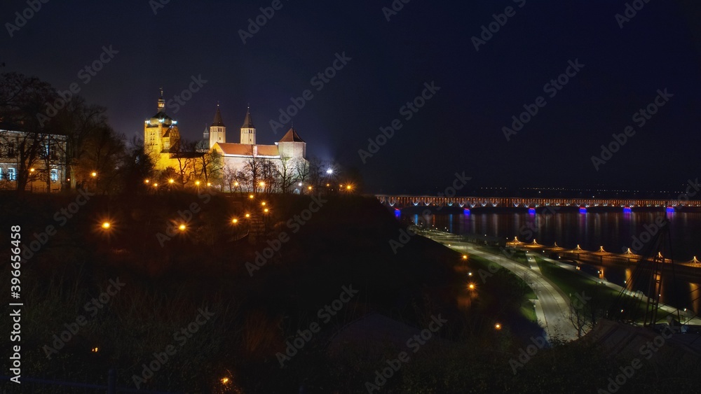 night view of the Tumskie hill and the bridge in Plock in Poland