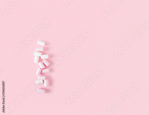 marshmallow on pink background