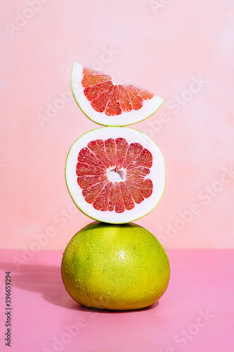 Stack of grapefruits on table photo