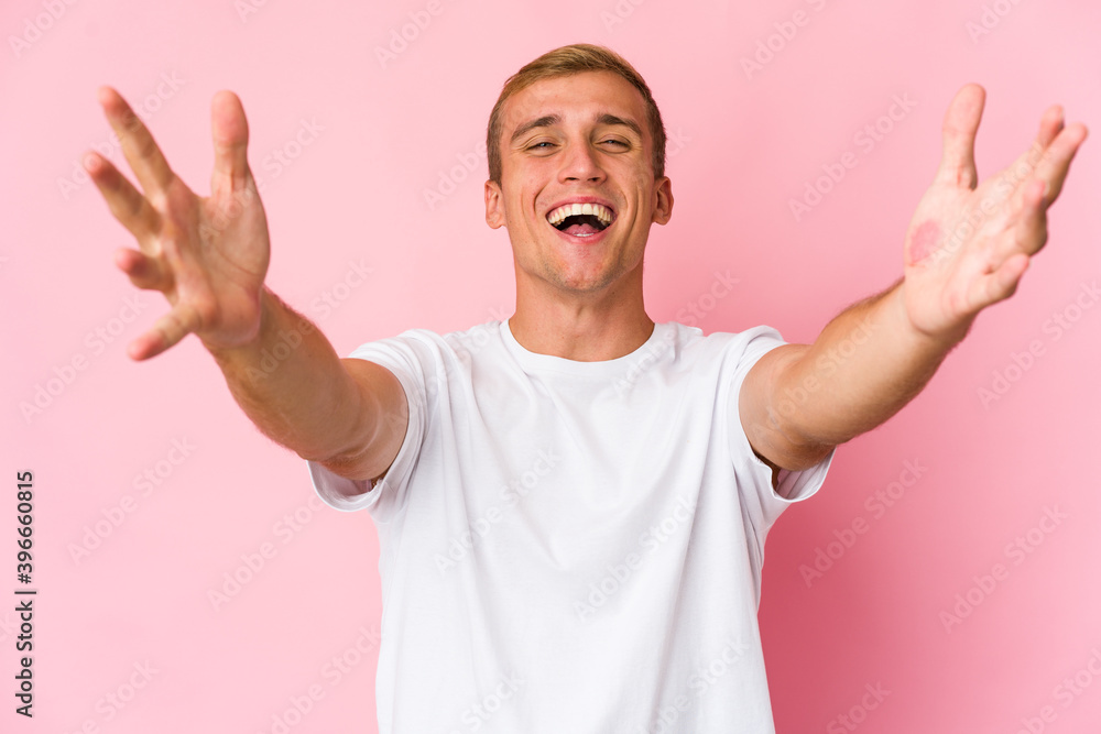 Young caucasian handsome man celebrating a victory or success, he is surprised and shocked. Young caucasian handsome man celebrating a victory or success, he is surprised and shocked.