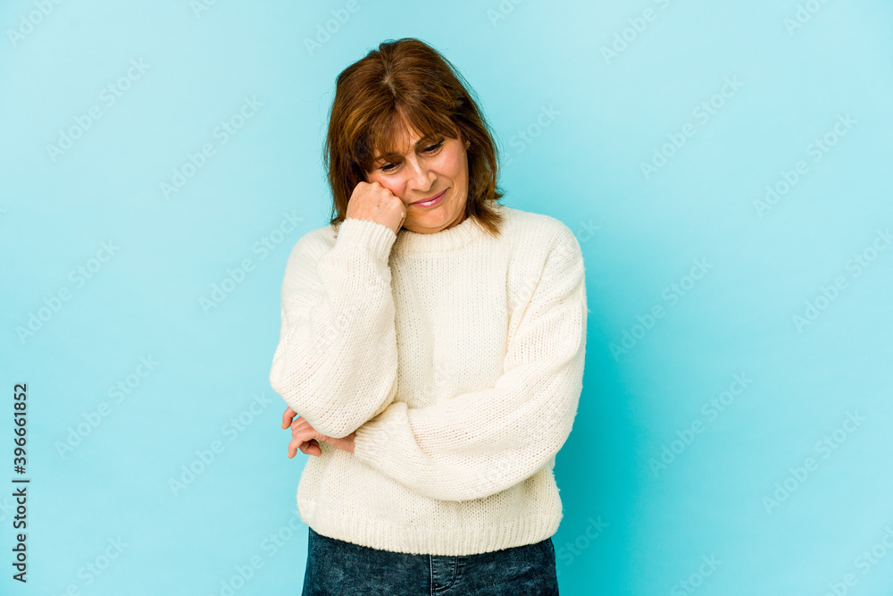 Senior caucasian woman isolated who feels sad and pensive, looking at copy space. Senior caucasian woman isolated who feels sad and pensive, looking at copy space.