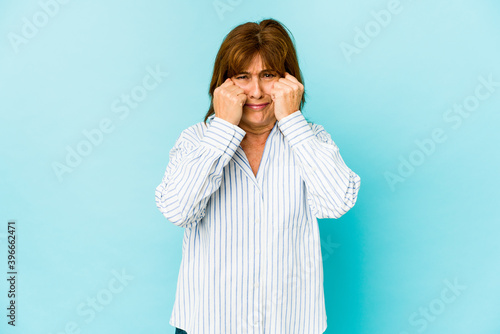 Senior caucasian woman isolated whining and crying disconsolately.