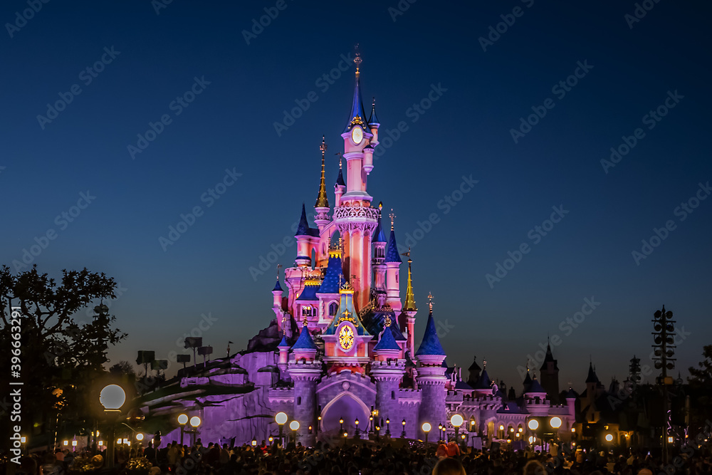 Night performances near Sleeping Beauty castle in Disneyland Paris. Disneyland  Paris (Euro Disney Resort) - entertainment resort in Marne-la-Vallee.  Marne-la-Vallee, France. March 30, 2019. Stock Photo