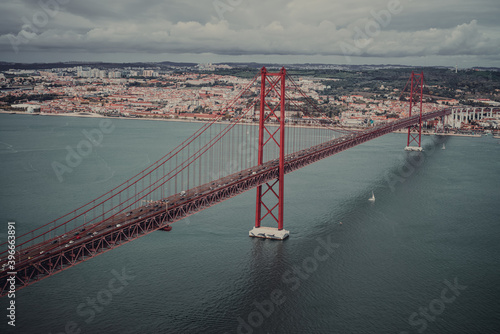 a great fast that stretches over the river. Bridge on April 25 in Portugal