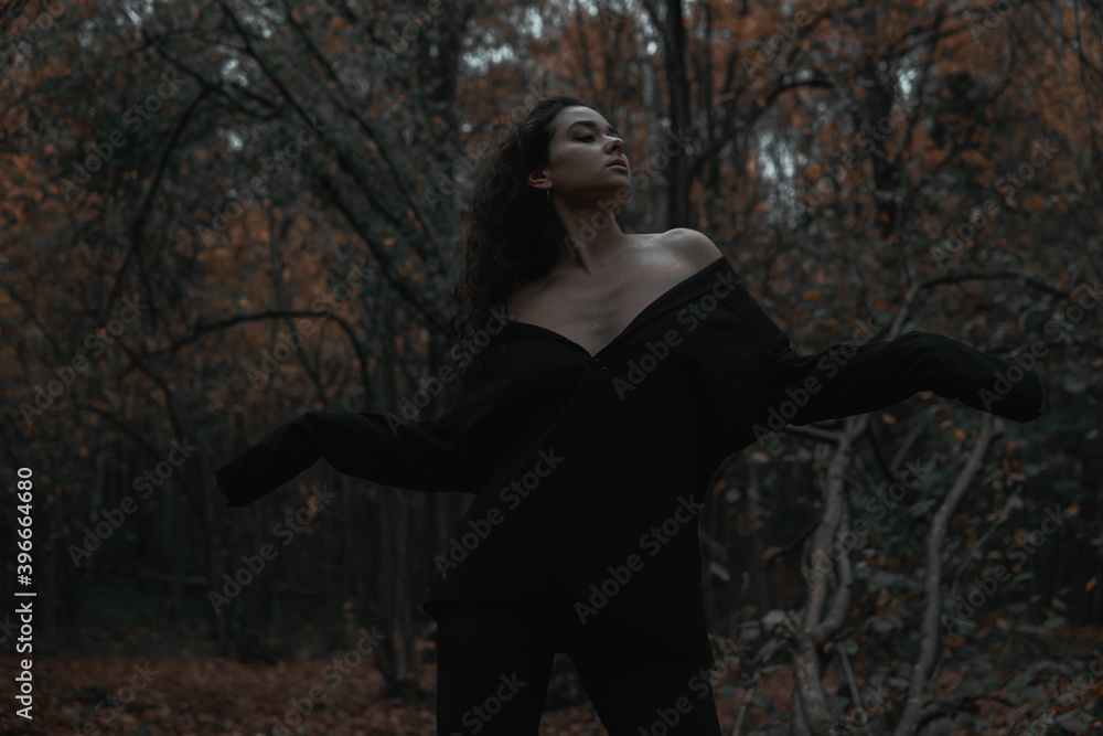 Lonely girl in a dark forest
Lonely girl in a dark forest