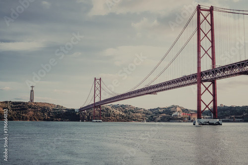 a large road bridge that stretches over the mountain river Tagus in Portugal. bridge on April 25