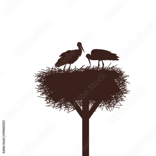 A pair of storks in their nest on the mast. Vector drawing