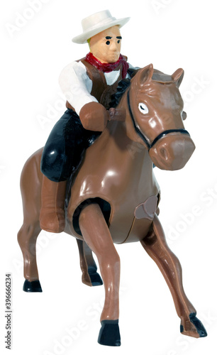 Plastic cowboy on horse. © Noel