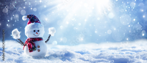 Snowman In Wintry Landscape