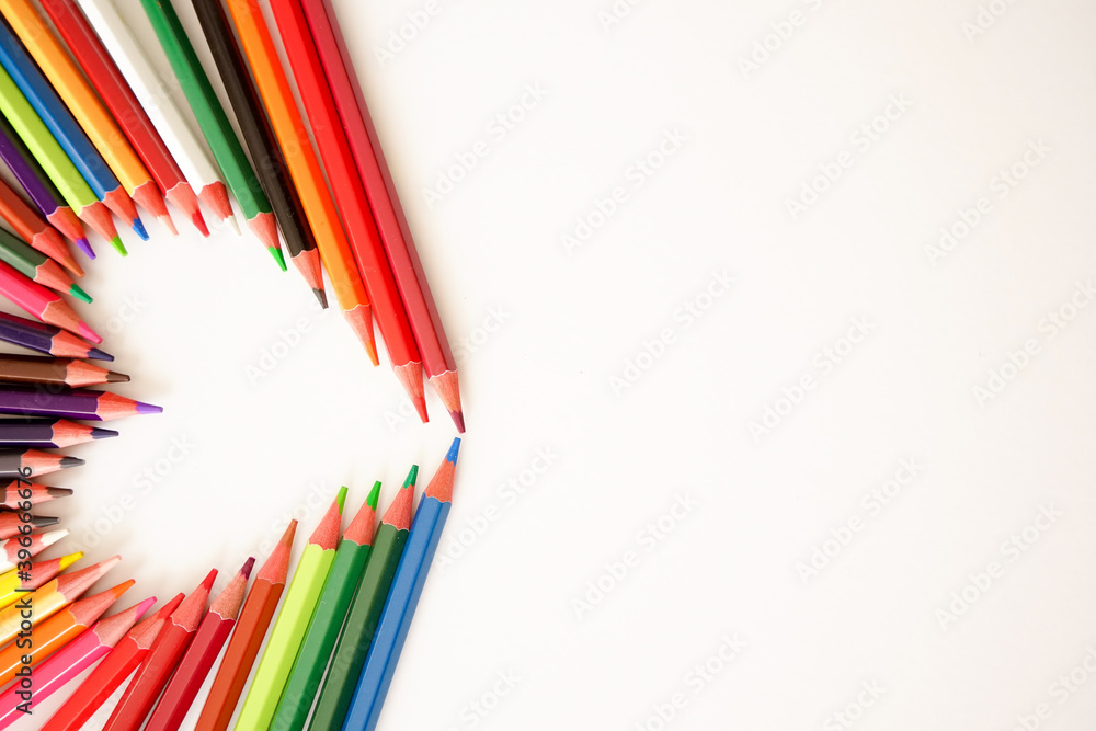 Fototapeta premium Multicolored pencils on white background