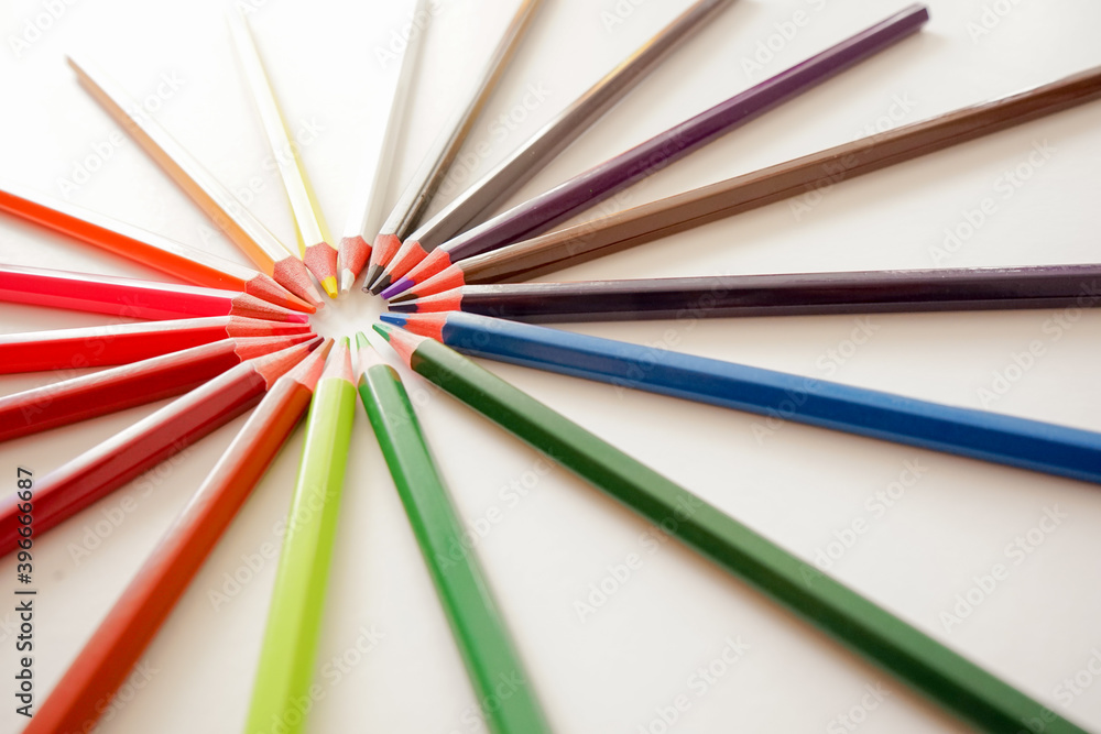 Multicolored pencils on white background Multicolored pencils on white background