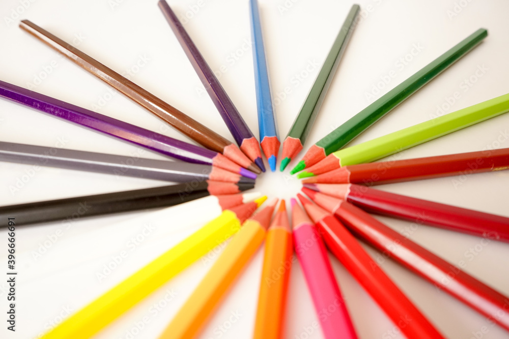 Multicolored pencils on white background Multicolored pencils on white background