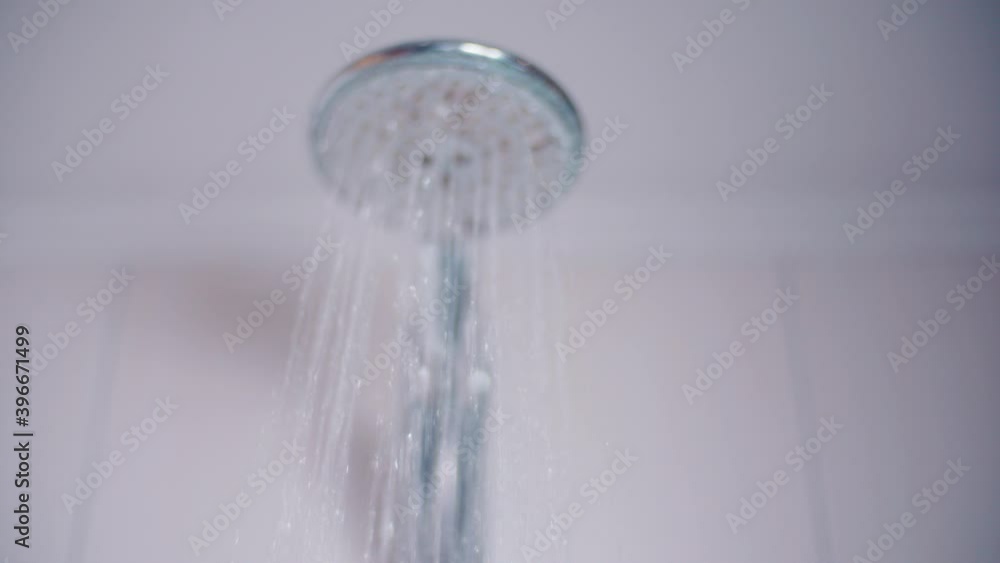 slow motion of Shower head with flowing water being shut off slow motion of Shower head with flowing water being shut off
