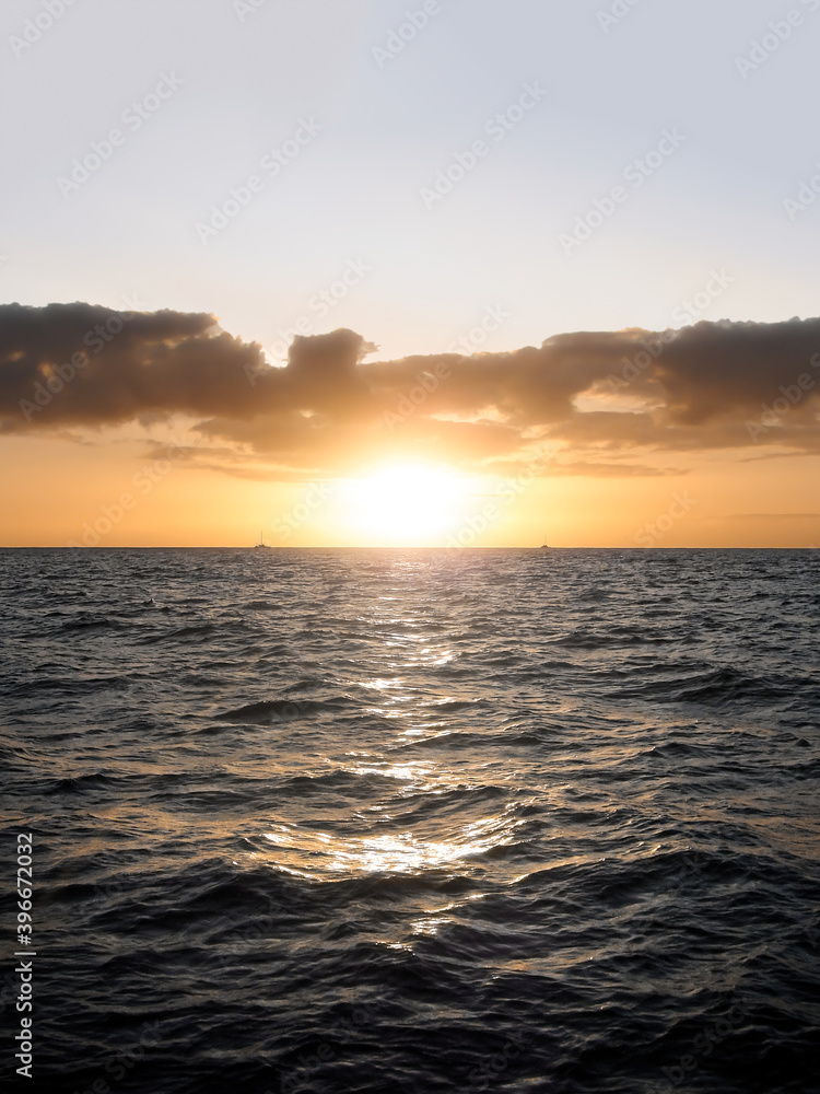 Sailing symetrically into the sunset, east shore Kauai Sailing symetrically into the sunset, east shore Kauai