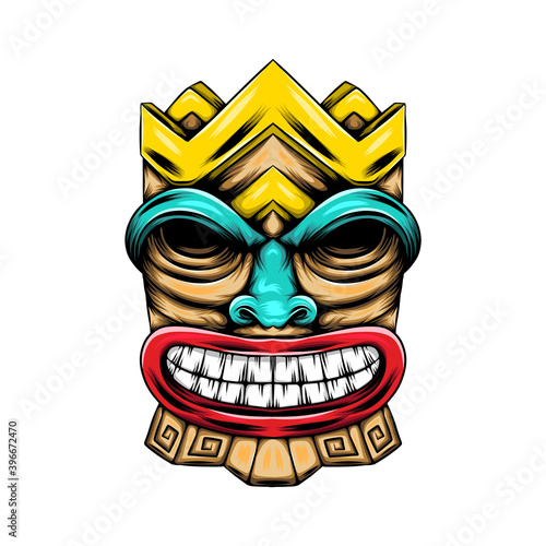 The monster wooden statue with the face and colorful pain for the mask inspiration